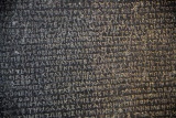 The Rosetta Stones inscriptions in Greek, Demotic, and Hieroglyphics enabled scholars to decipher the ancient Egyptian writing