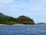 After two hours of rough seas, we passed on the leeward side of this island