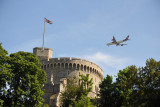 Virgin A340 flies past the Round Tower on approach to Heathrow