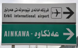 Roadsign for Erbil International Airport and Ainkawa, the Christian suburb of northern Erbil