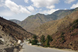 The road to Paro follows the south bank of the Pachhu River