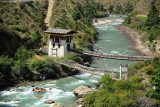 A wire suspension foot bridge and a traditional tower bridge over the Paro River, km 5