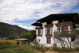 Traditional house with its open attic space on the road to Paro
