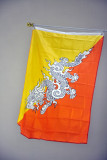 Flag of Bhutan - the Thunder Dragon with Buddhist orange and the royal yellow