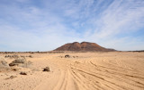 Tracks through the sand leading towards Jabal Alarambi