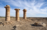 Temple of Sesibi, three columns and a pile of rubble