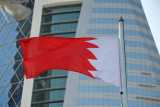 Flag of Bahrain in front of the Bahrain World Trade Centre