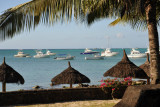 Thatched beach umbrellas, Grand Baie