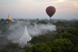 Balloon passing over a smoking fire, Bagan