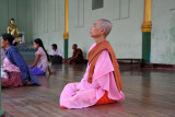 Buddhist nun (Thilashin) meditating, Shewdagon Paya