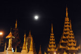 Full moon over the gilded roofs and stupas of Shwedagon Paya