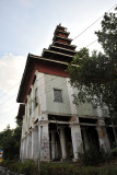 Decaying monastic buildings at Ngahtatgyi Paya