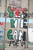 West Bank Separation Wall graffiti - Yes We Can in Palestinian flag colors