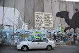 West Bank Separation Wall graffiti - Bahamas Sea Food, menu for a restaurant next to the wall