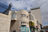 Bus 21 from the Arab bus station in East Jlem costs NIS 6 and leaves you at the corner of Hebron Street and Beit Jala Street.