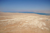 View of the desert at the base of Masada, the Dead Sea and the runway of Bar Yehuda Airport