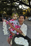 Flower seller with her cute daughter, Mandalay