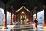 Covered walkway leading to the main temple at Kuthodaw Paya, Mandalay