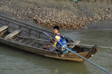 Young long tail boat driver, Bagan