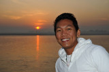 Dennis with sunrise on the Irrawaddy River