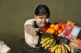 Burmese girl trying to make a sale during the Malikhas brief stop in Myinmu