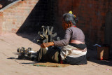 Woman working a spinning wheel, Bhaktapur