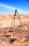 Joe Tripod atop a fin with numerous potholes