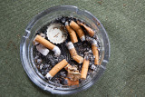 Cigarette butts in ash tray