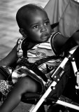 African child in stroller 