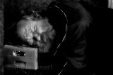 Man sleeping with head on box