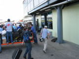 everyone standing outside, no commercial flights into Haiti, only chartered or cargo planes