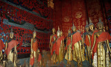 Buddha images inside the funerary carriage house,  Wat Chieng Thong, Luang Prabang