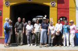 Group picture at the street entrance to the home