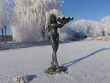 statue in water , now ice