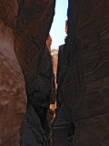 First glimpse of The Treasury, thru narrowest  opening - columns in lower portion