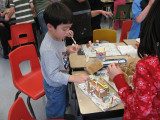Kyle and Sarah making gingerbread houses