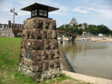 Old stone lighthouse beside Hoto-sanbashi Pier