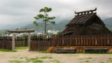 Wooden gate and kings hut