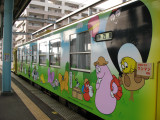 Colorful, cartoony Imari-bound train