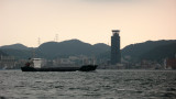 Boat passing in front of Moji-ko