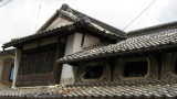 Old buildings along a residential street