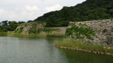 Stone walls of old Hagi Castle along the moat