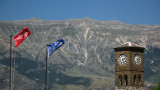 Clock tower with Albanian and EU flags