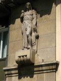 Statue on a building corner, Trg Slobode