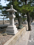 Stone lanterns on the path to the Meoto-iwa