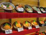 Noodle and seafood donburi display