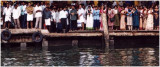 Waiting for the ferry. Men on one side, women on the other