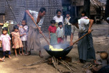Myinkaba. Cooking a local delicacy