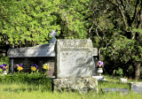 grave with purple yellow flowers.jpg