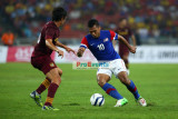 Mohd Safee takes on a ManCity player